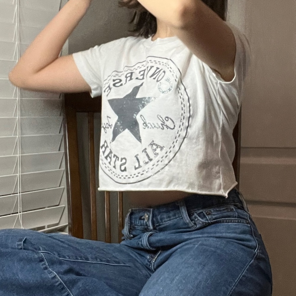 White Converse crop top.